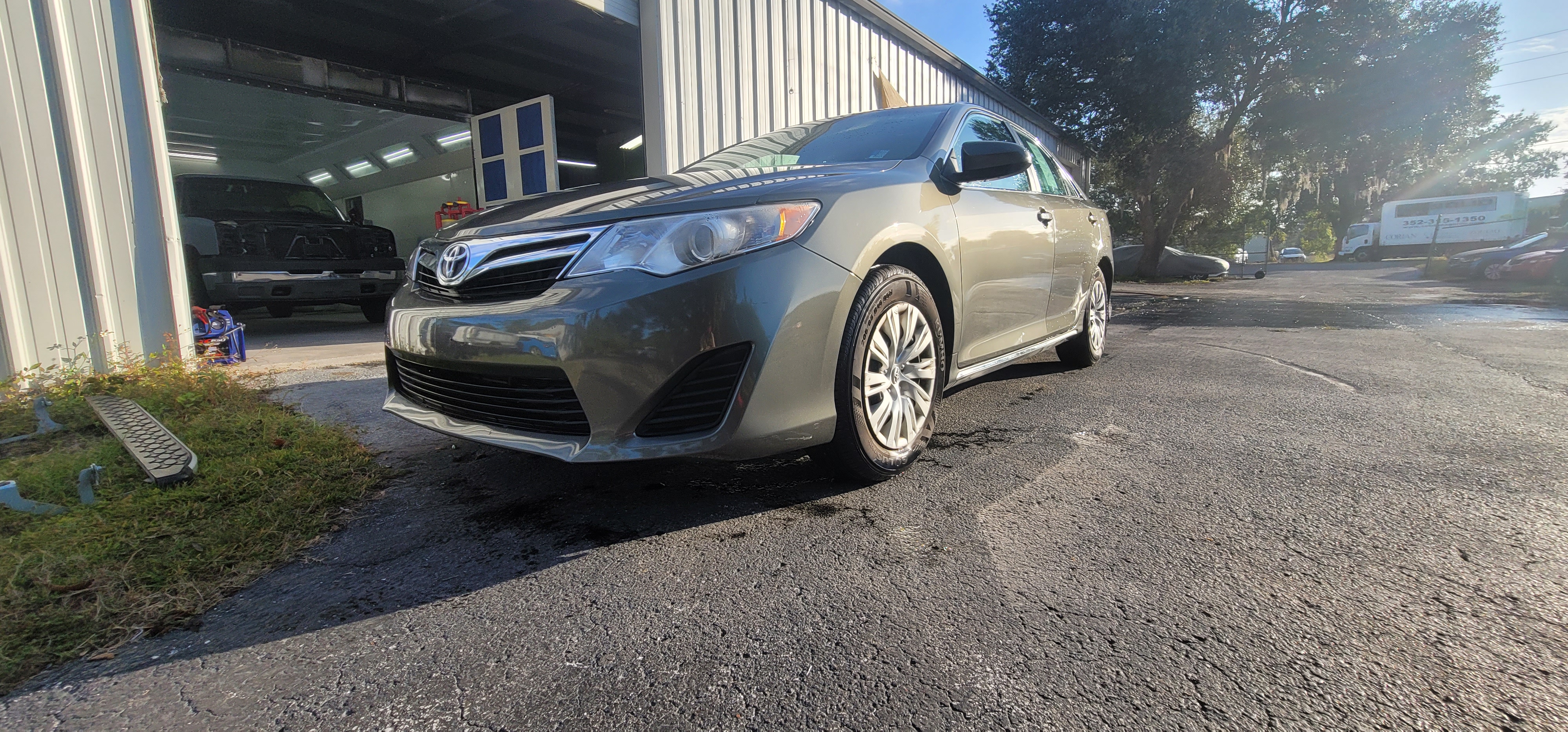 Toyota Camry LE before full paint job - front view at The Drip Auto Body Leesburg FL