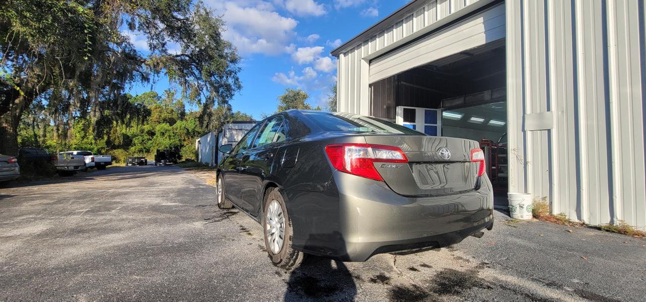 Toyota Camry rear quarter after paint job outside shop at The Drip Leesburg