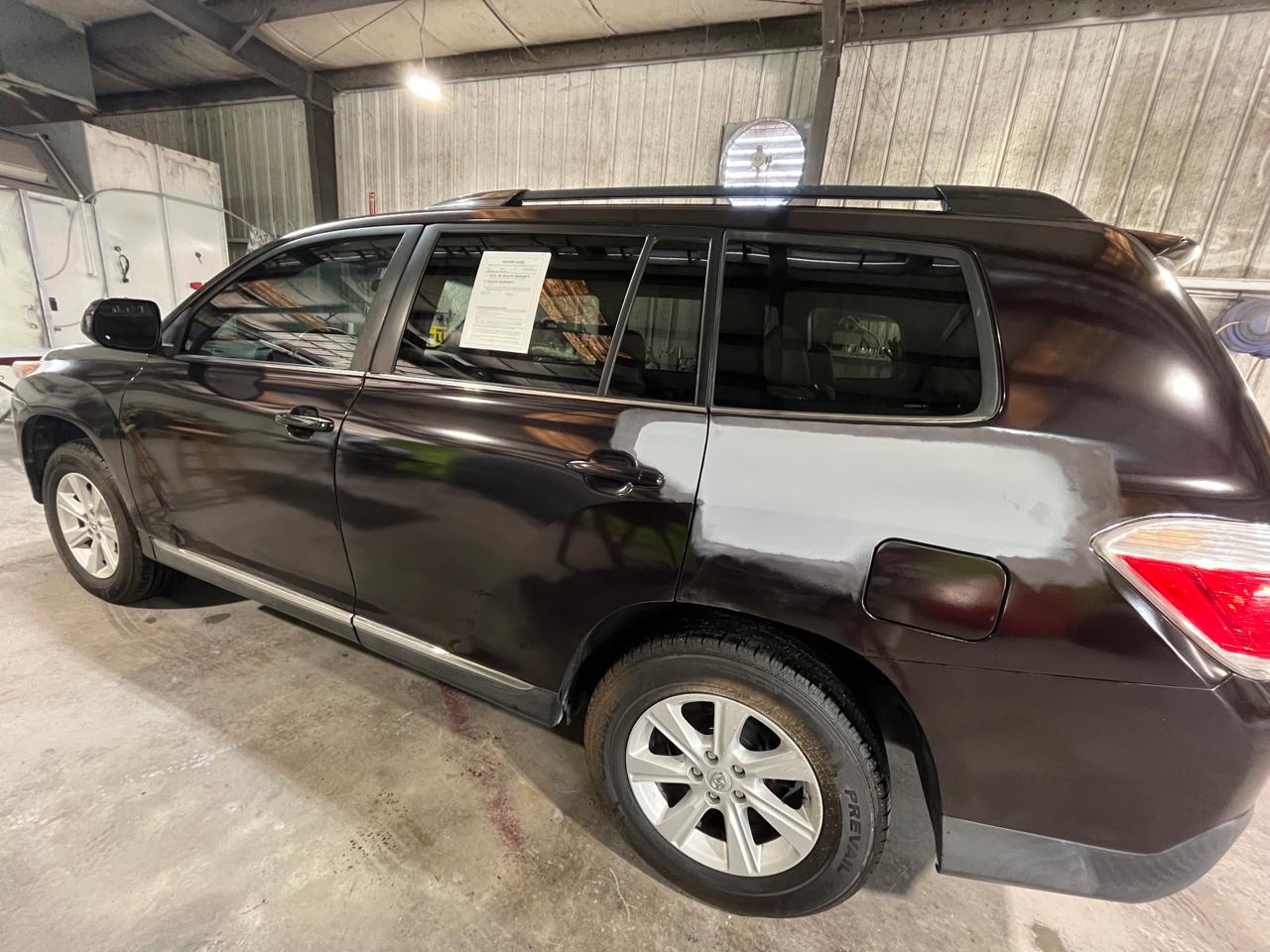 Toyota Highlander in shop for paint repair at The Drip Auto Body Leesburg FL