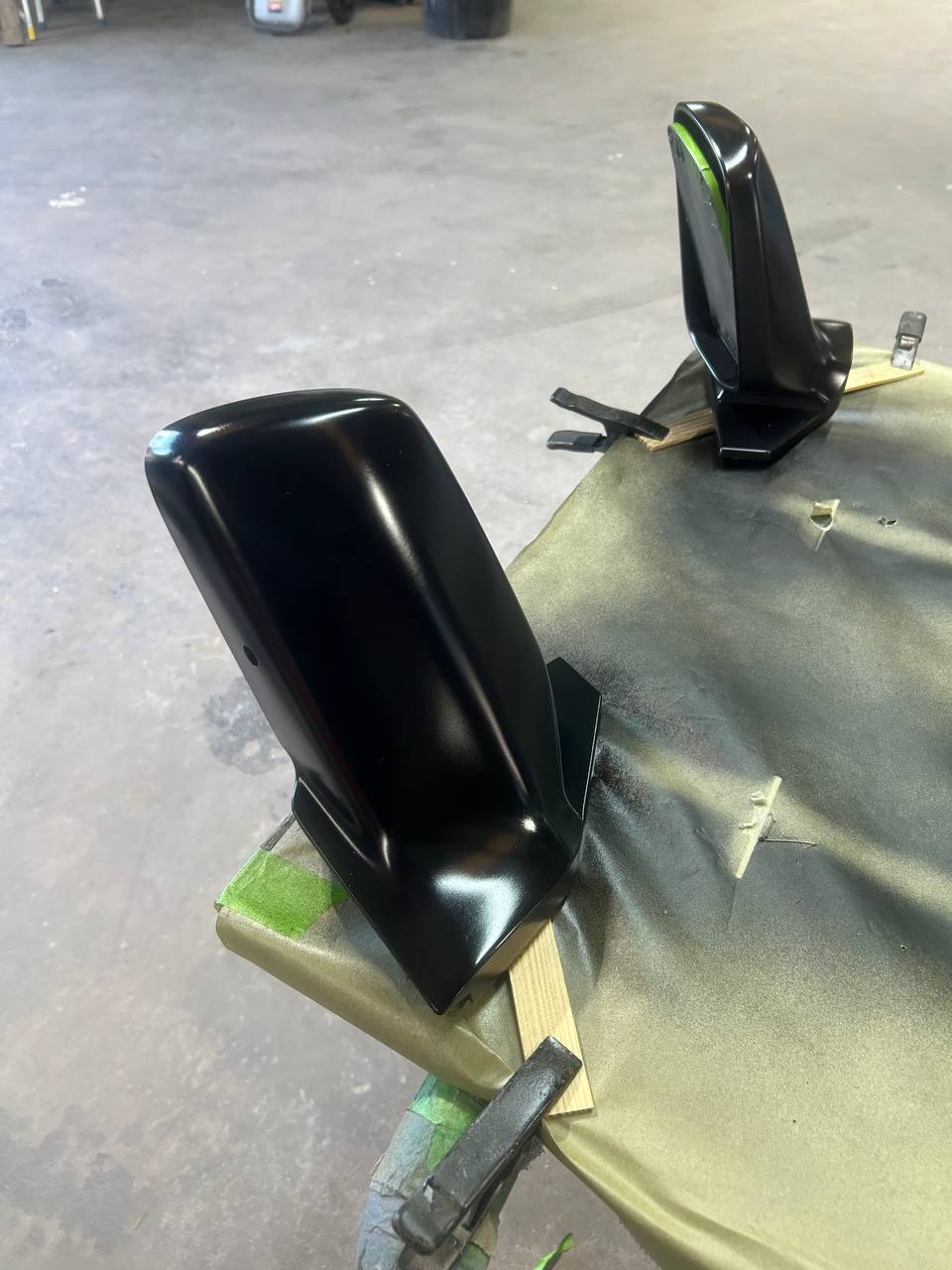 Jeep Wrangler mirror caps freshly painted gloss black during restoration at The Drip Auto Body Leesburg
