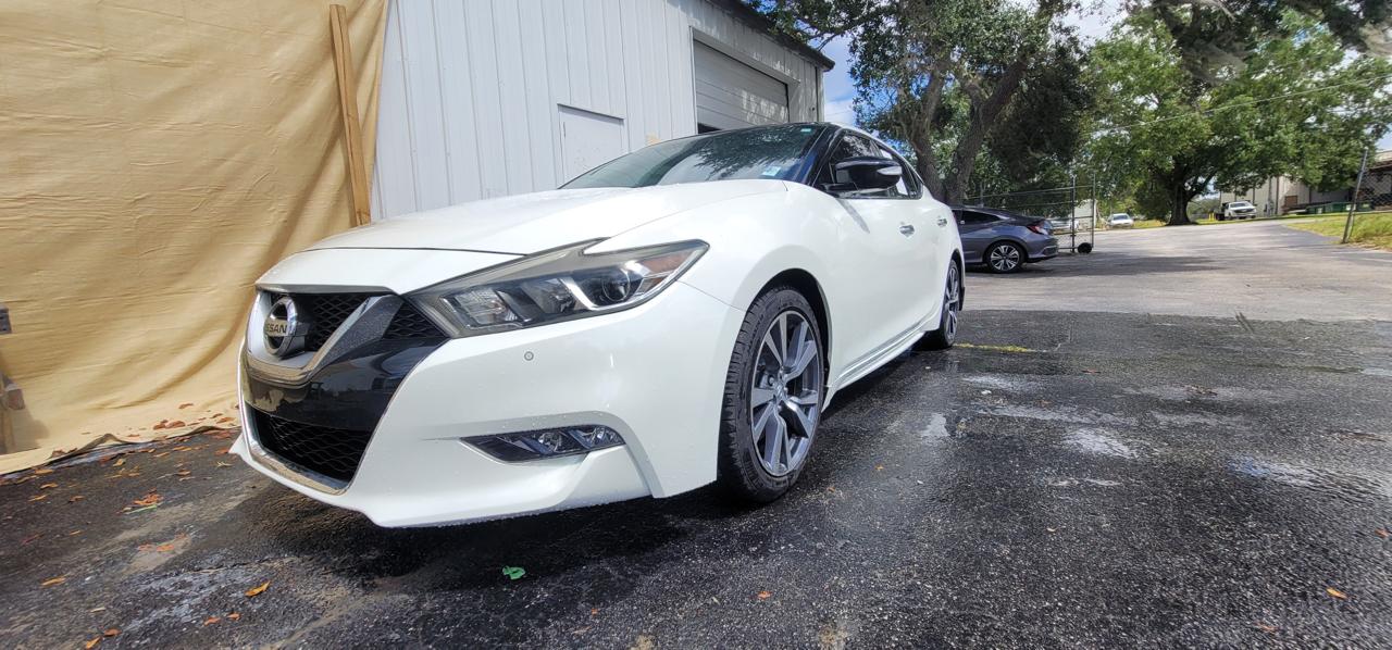 Nissan Maxima Platinum completed repair - front angle view at The Drip Auto Body