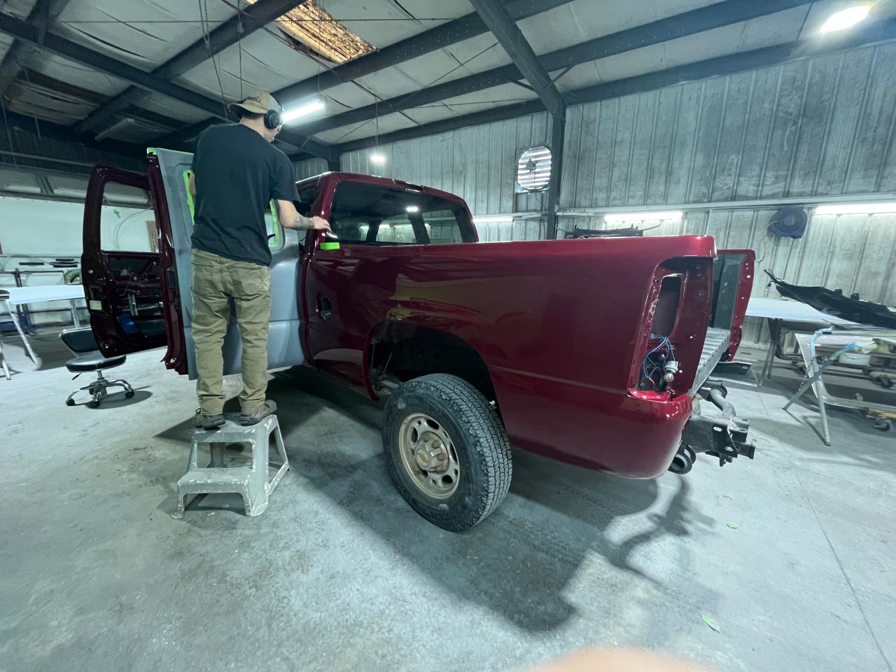 Chevy Silverado freshly painted rear bed and quarter panels at The Drip Leesburg FL