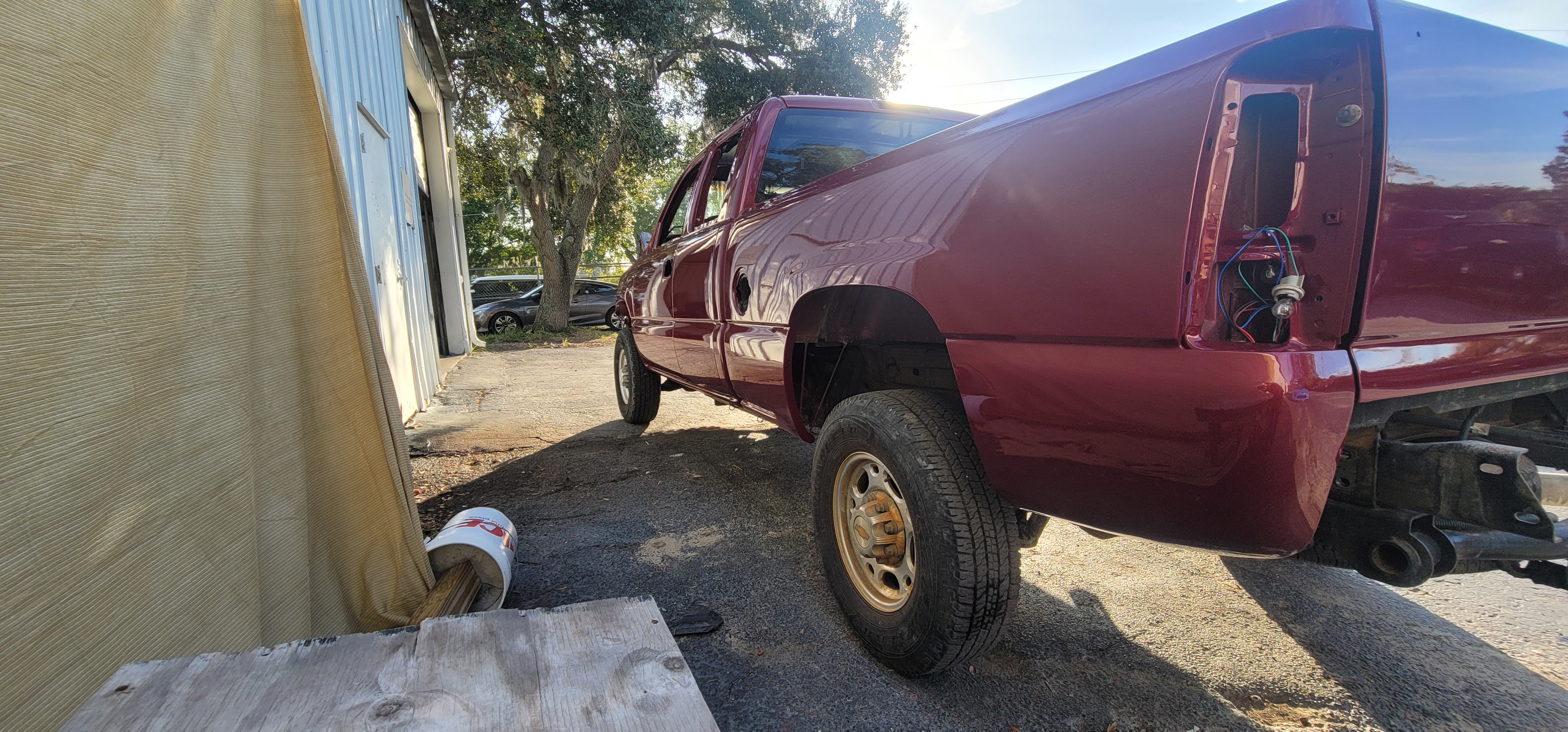 Chevy Silverado rear quarter freshly painted during restoration at The Drip Auto Body