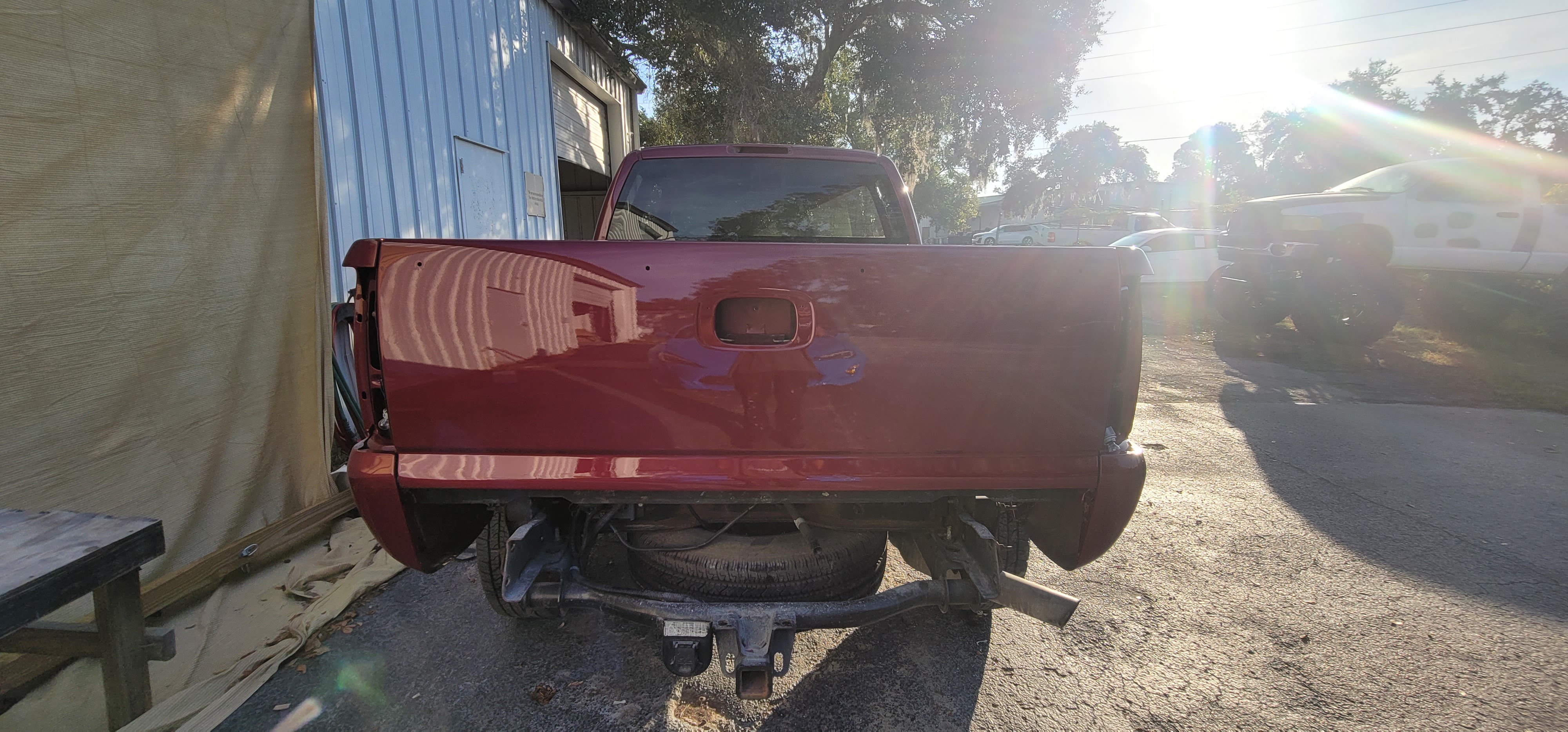 Chevy Silverado freshly painted tailgate and bed during full rebuild at The Drip Leesburg