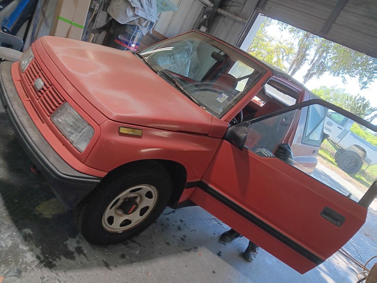 Geo Tracker full paint restoration - front view at The Drip Auto Body Leesburg FL