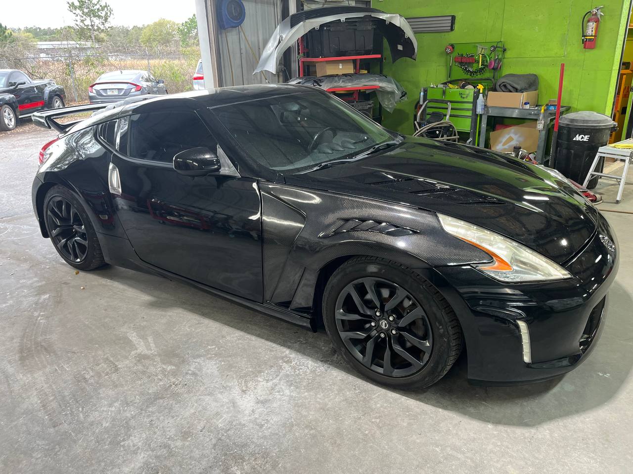 Nissan 370Z after - glossy black front 3/4 view