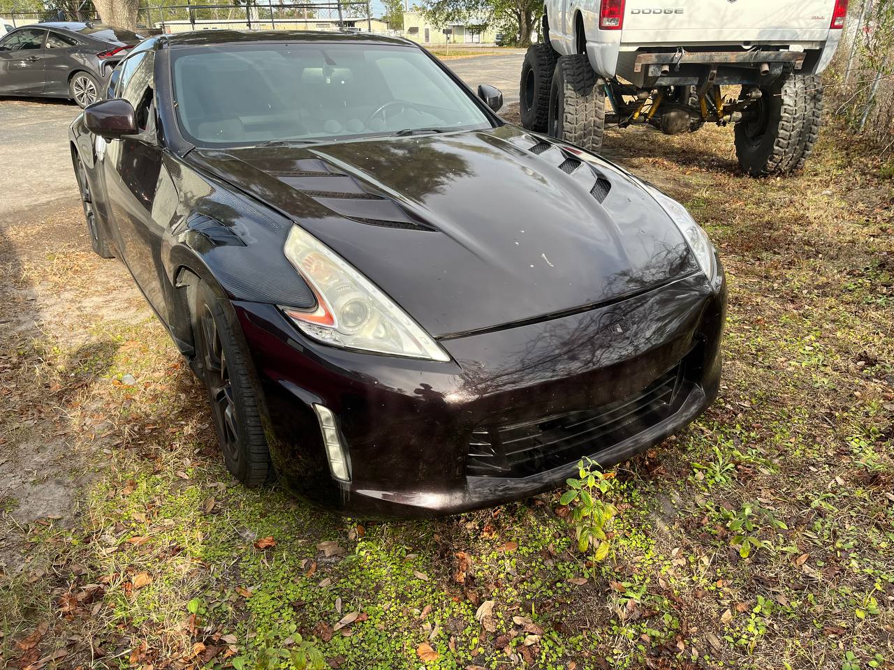 Nissan 370Z before - faded paint and clear coat failure