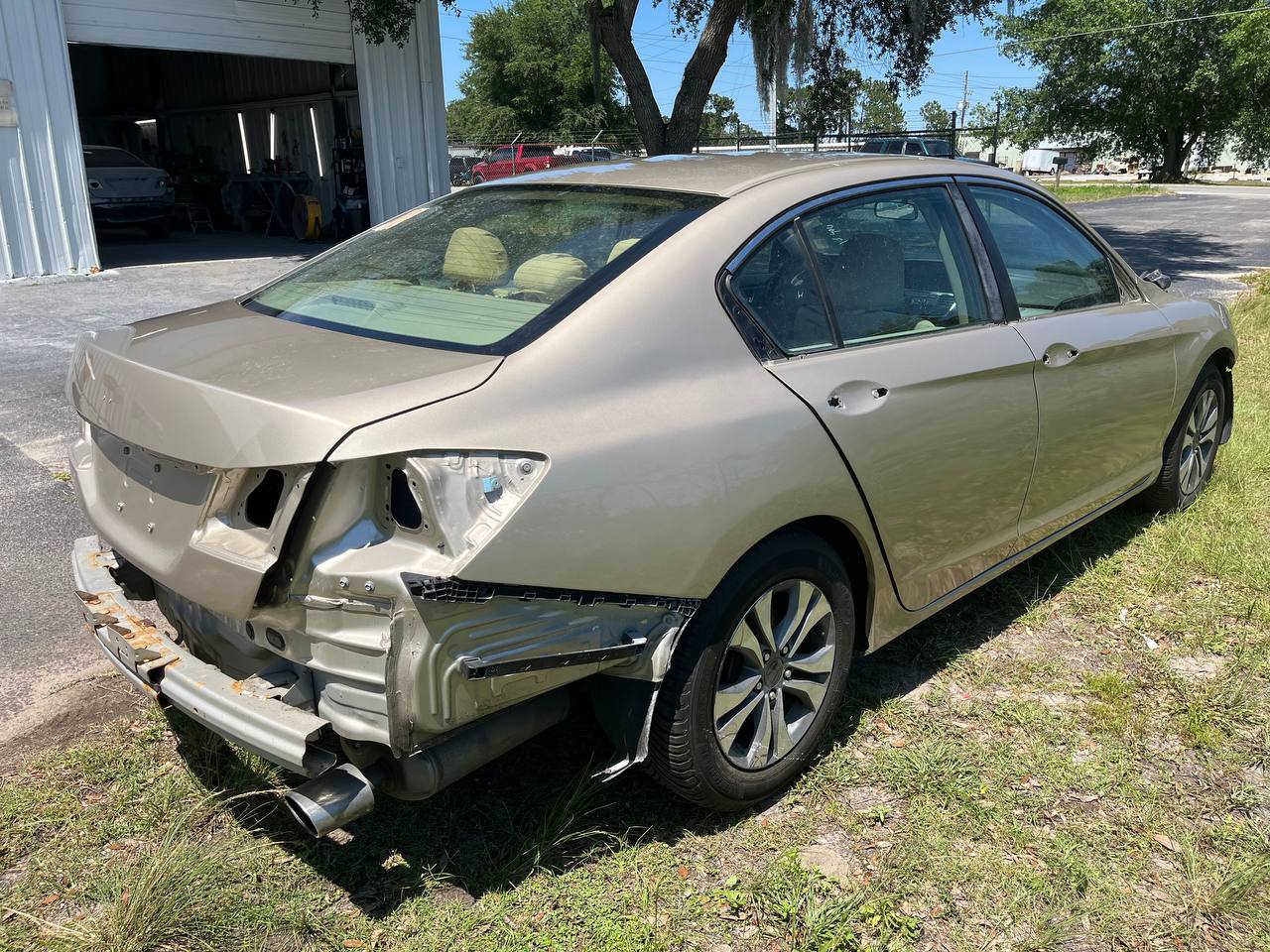 Honda Accord disassembled - rear panels removed for paint