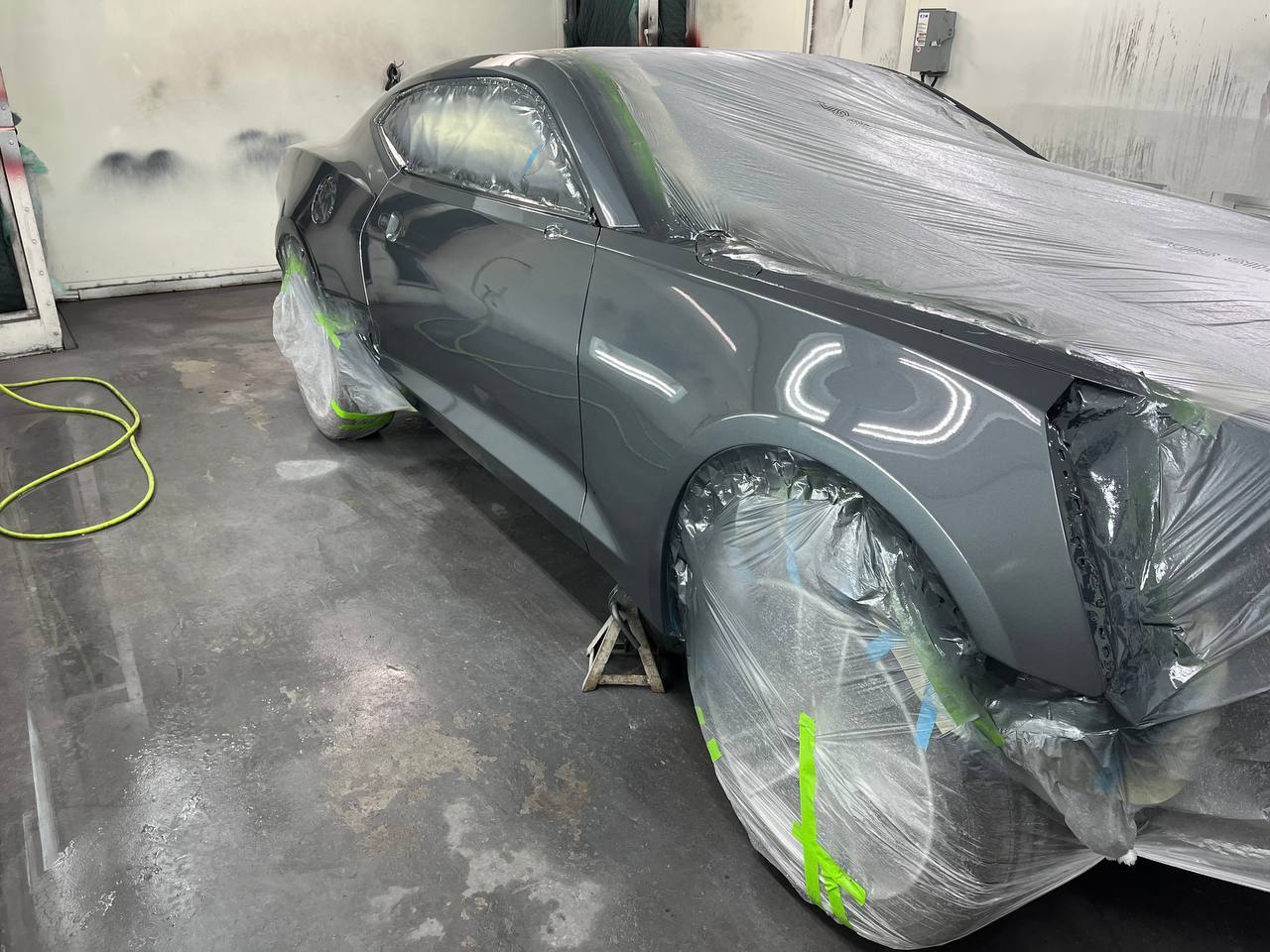 Chevy Camaro in paint booth - masked and prepped