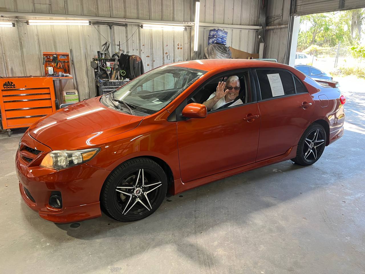 Toyota Corolla after - full custom orange paint complete